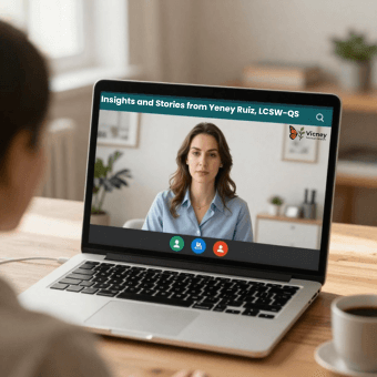 Client attending a virtual therapy session with Yeney Ruiz, LCSW-QS, on a laptop during a video call.